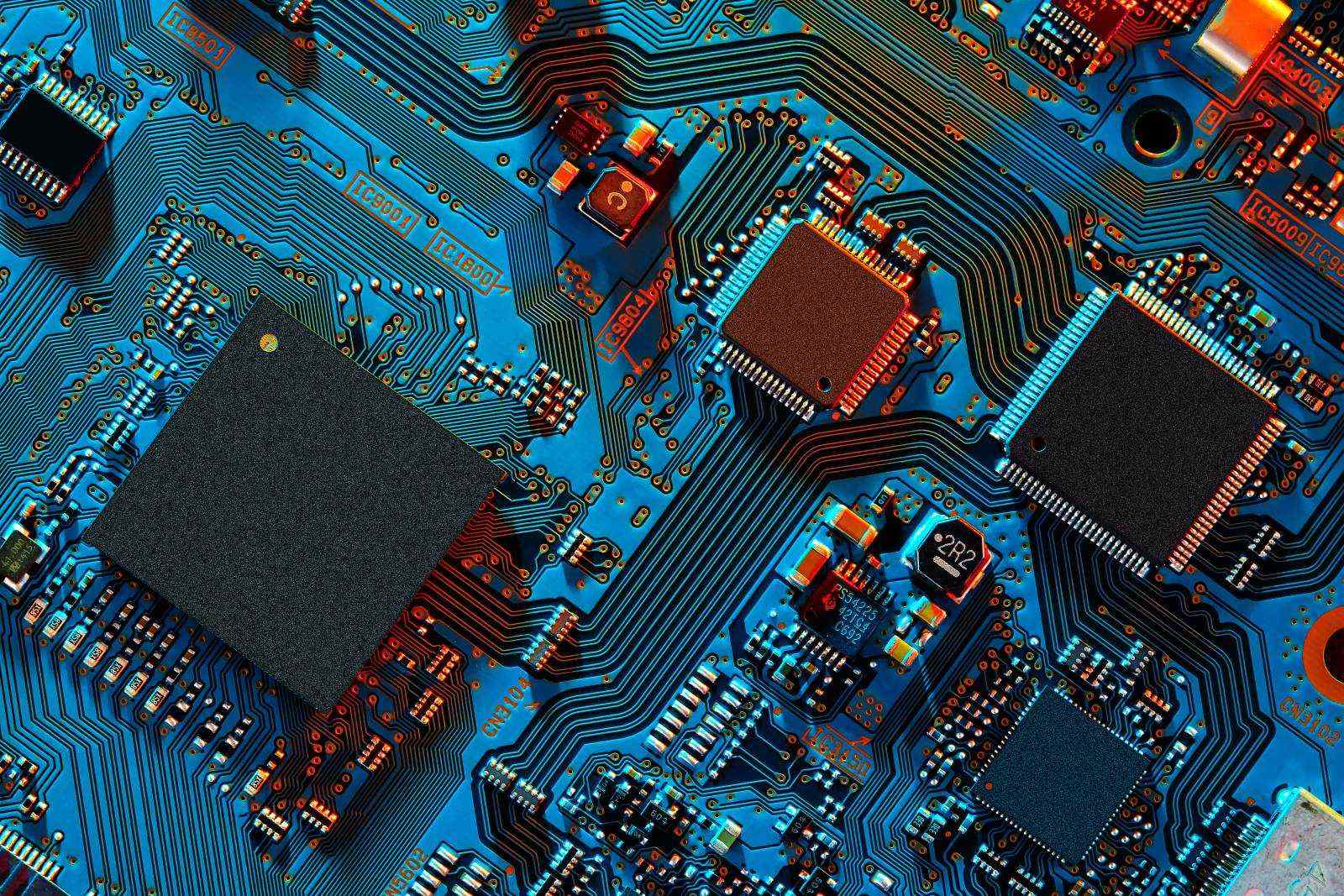 Electronic circuit board close up showing surface-mounted semiconductors and other components