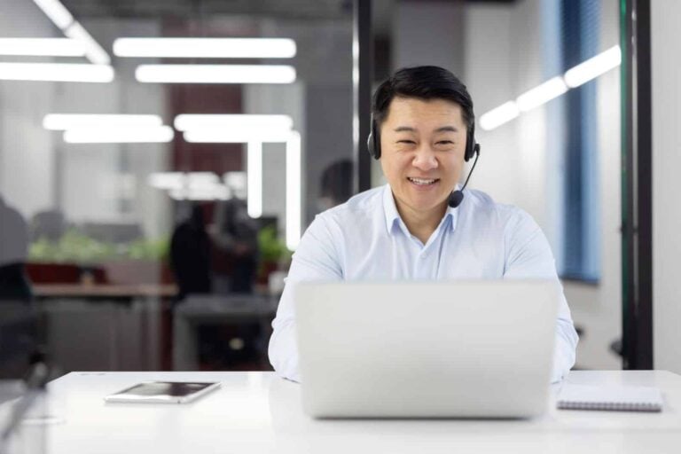 chinese businessman demonstrating how he uses online payment services platform for tax payments