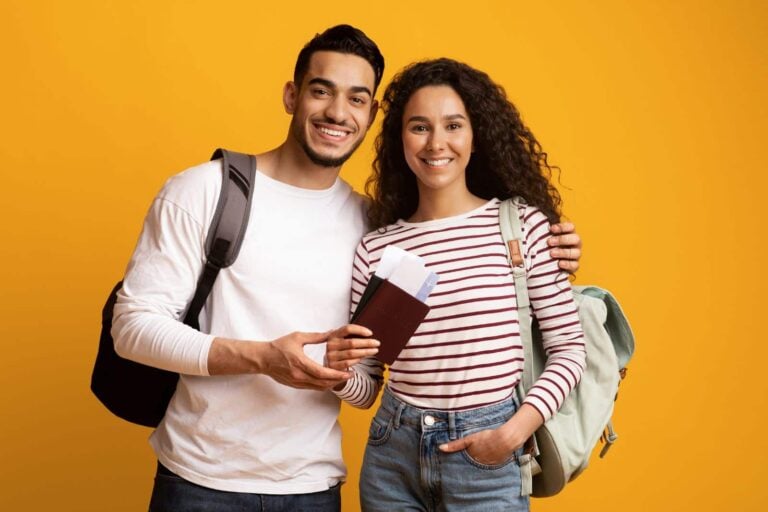 self empowered young couple heading off on adventure holiday