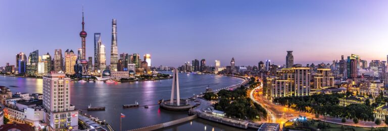 Shanghai, China - view of Lujiazui district at dusk across the Huangpu river with the Oriental Pearl Tower and the Shanghai Tower clearly visible