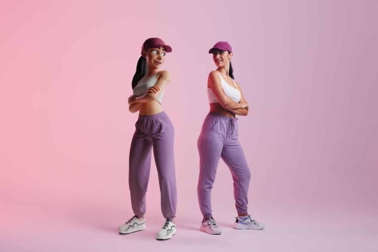 Happy young woman standing next to her metaverse avatar in a studio. Cheerful young woman smiling at the 3D simulation of herself. Young woman exploring virtual reality.