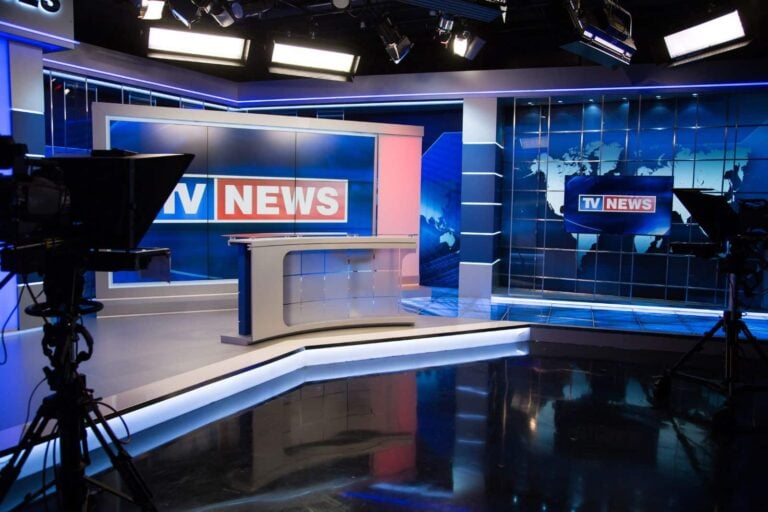 TV news studio between news bulletins