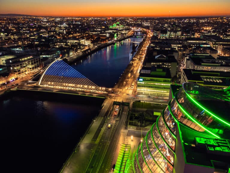 Dublin, Ireland - citycape at dusk with the the River Liffey and Samuel Beckett Bridge visible in the centre