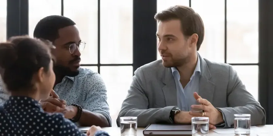 Moderator conducting face-to-face focus group in European capital