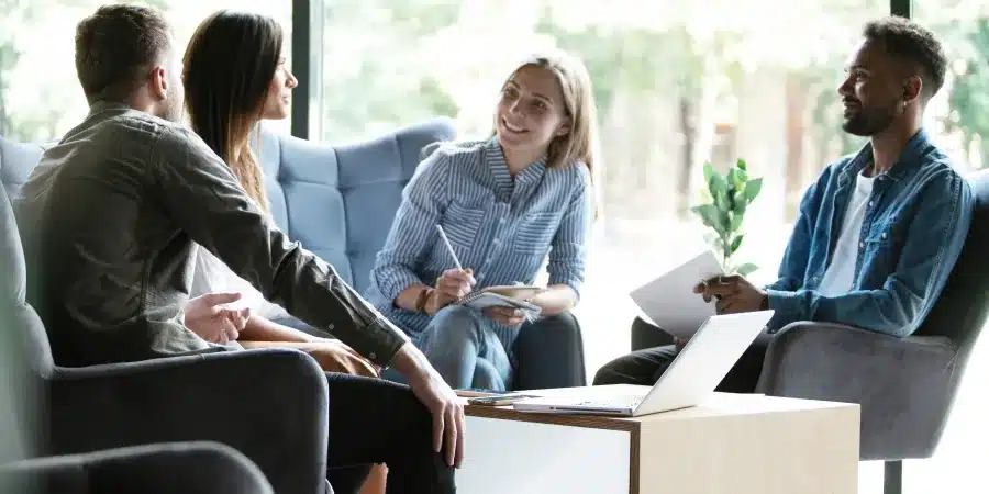Young European business people taking part in a group interview