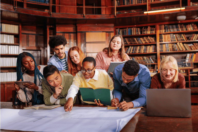 Group of researchers writing a market research brief for a project