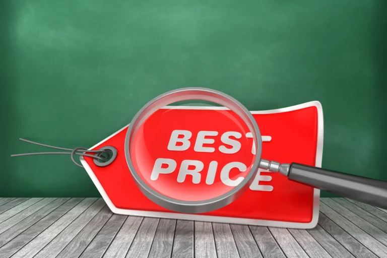 Concept of market research to find the best price. Magnifying glass over 'Best Price' tag against chalkboard background